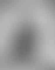 Black & white Portrait of a woman crossed legs with eyes closed