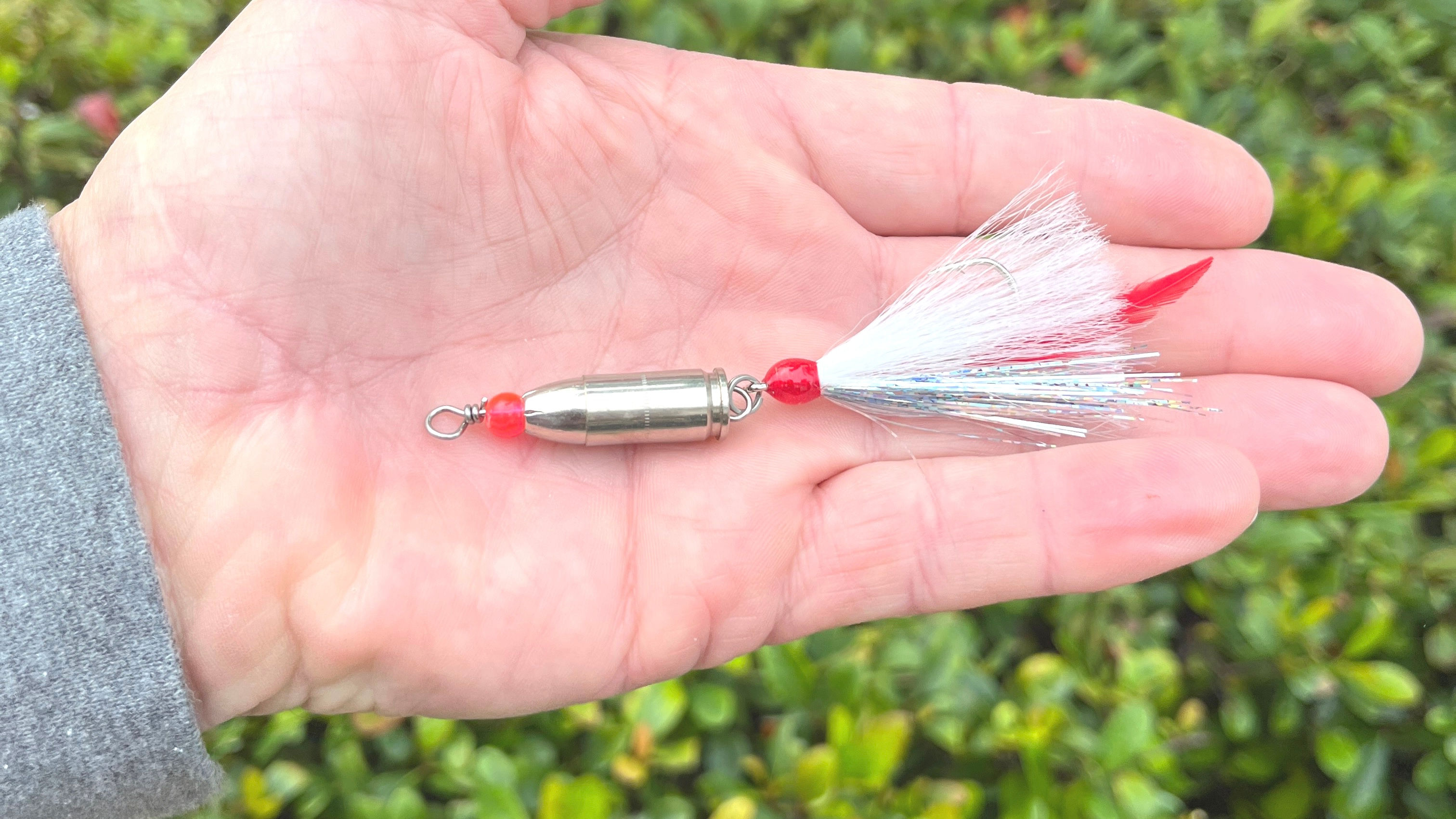 A classic bucktail jig made with a 9mm bullet and hand tied bucktail
