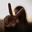 focus photography of woman hand with peace sign_edited.jpg