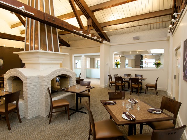 Interior of The Pottery Alpine Restaurant at Blue Mountain Resort, featuring rustic lodge‑style décor with wood beams, warm lighting, and cozy seating that reflects Alpine charm.