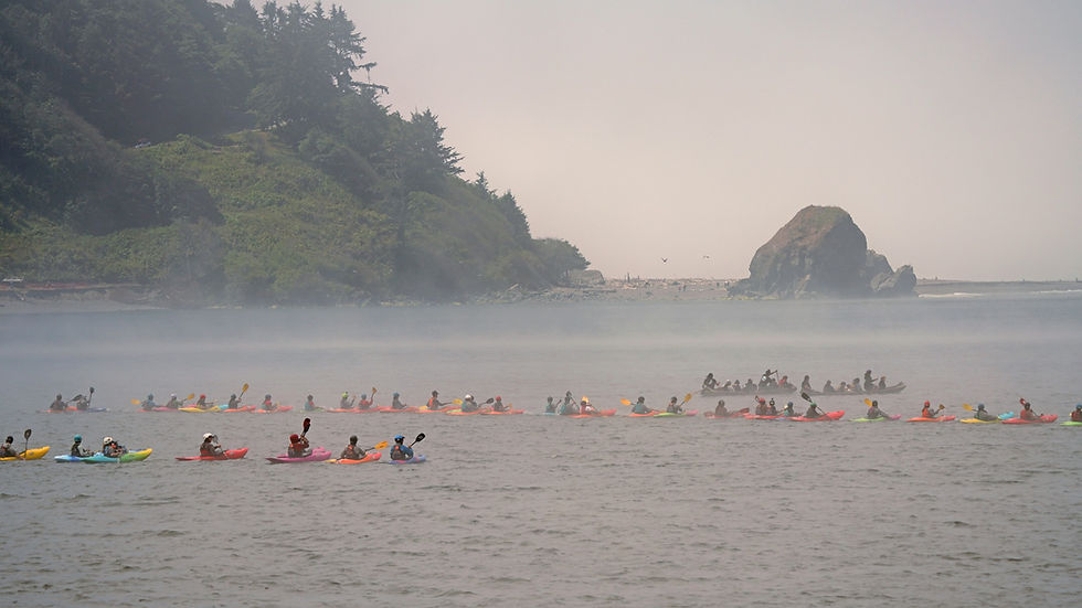 Indigenous youth paddling from the Klamath River to the Ocean.