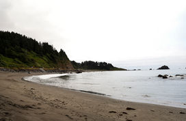 An empty Lagoon Creek Beach on a cloudy day in Klamath, California