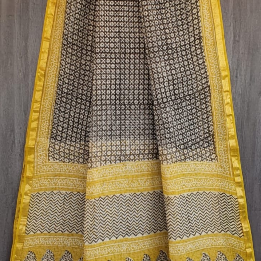 Black and yellow Kota Doria saree with paisley border