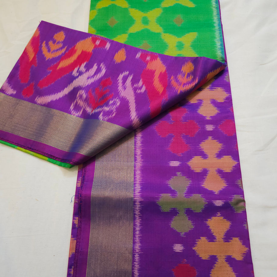 Green and violet pochampally saree with ikat patterns