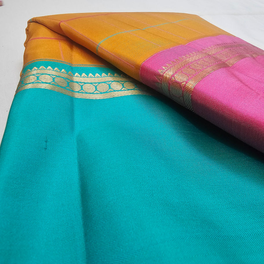 Mustard silk saree with ganga jamuna border