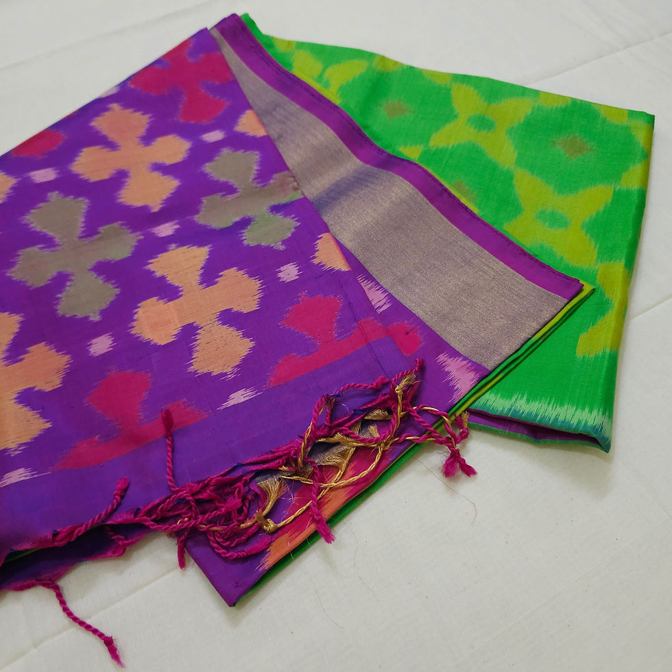 Green and violet Pochampally silk saree with ikat patterns