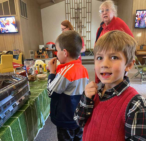 Kids having a meal at church