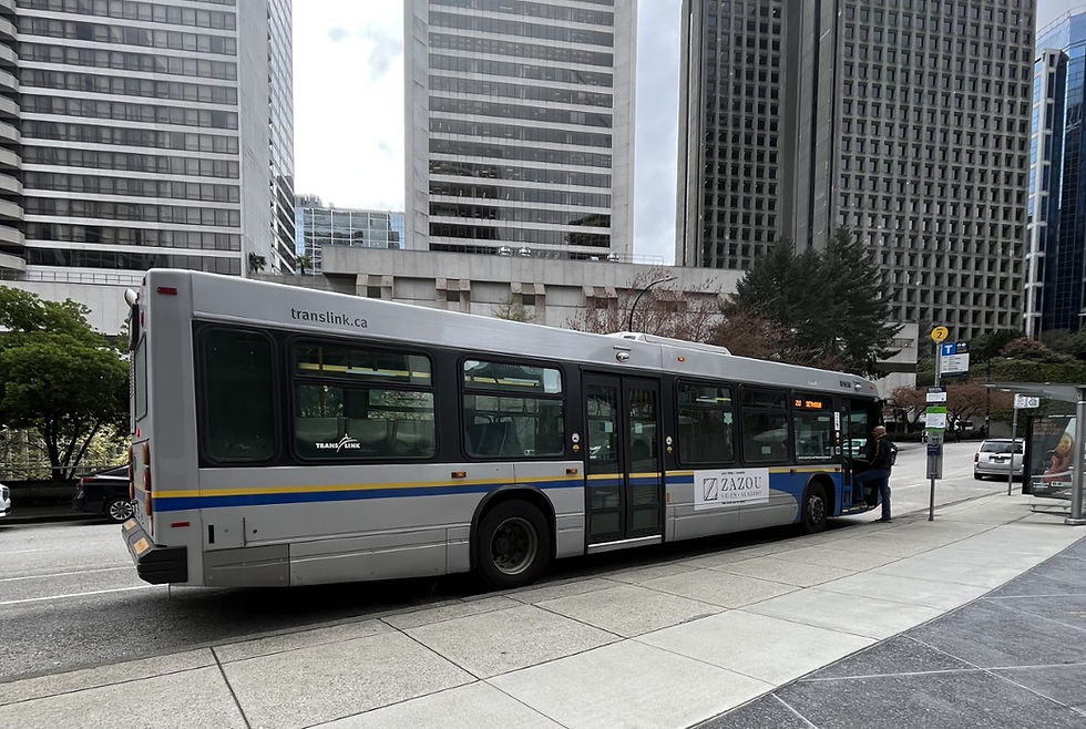 Public transit bus, vancouver downtown in background