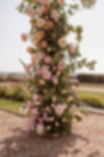 An English Countryside Wedding at Somerley House, peony and rose flower arch