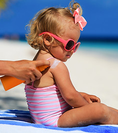 applying-sunscreen-to-little-girl-baby.jpg