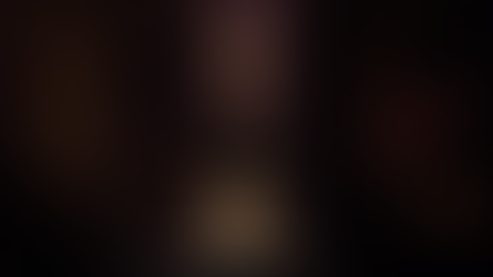 Staged illustration of Armand Rousseau Chambertin 2020 against a dark wine-cellar backdrop.