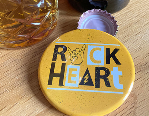 Personalised bottle opener next to lager bottle