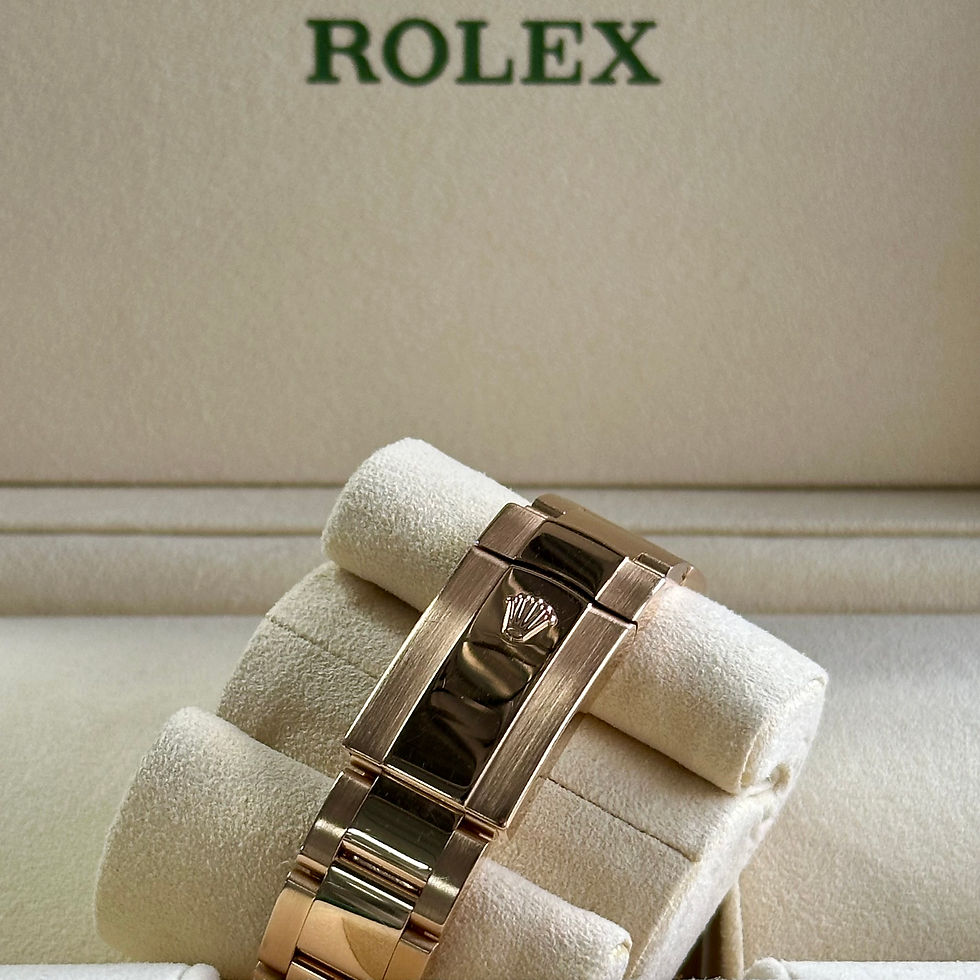 Thumbnail: Rolex Sky Dweller in Rose Gold with Rose Sunburst Dial model reference 326935. being displayed in its box