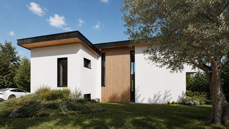 Maison contemporaine à Mougins avec façade blanche, bardage bois et jardin paysager