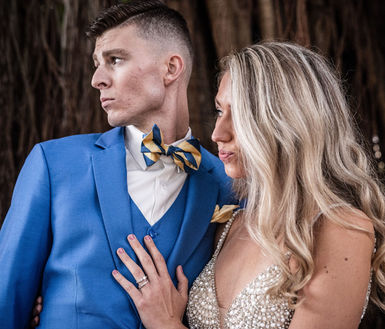 a couple posing infront of a banyan tree in st pete for their wedding