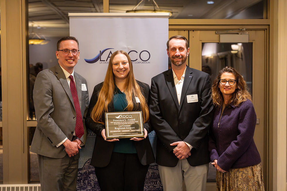 JR Roberts, Lauren Kloss receive award from Vicki Markussen and Joe Zoellner