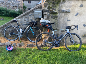 two bikepackers cycling in auvergne
