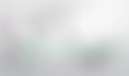 Curva bifásica da fotobiomodulação mostrando a Lei de Arndt-Schulz, com regiões de estímulo celular, dose ideal e inibição por excesso de laser