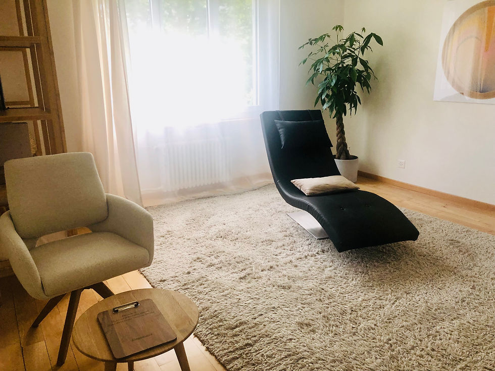 Eye-level view of a calm therapy room with a comfortable chair and soft lighting