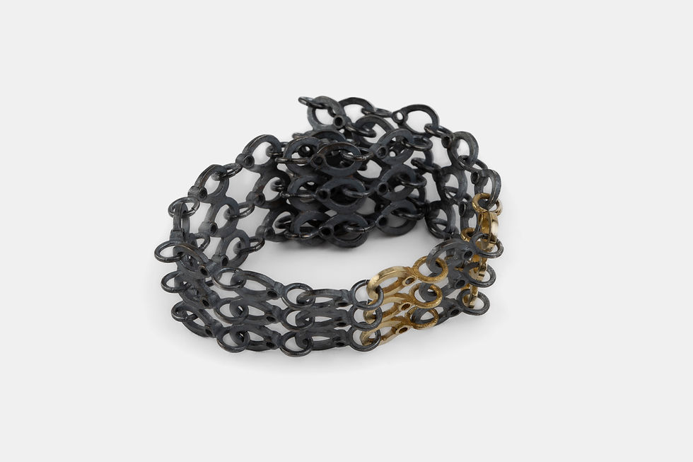 Thumbnail: Black Silver and Gold Bracelets