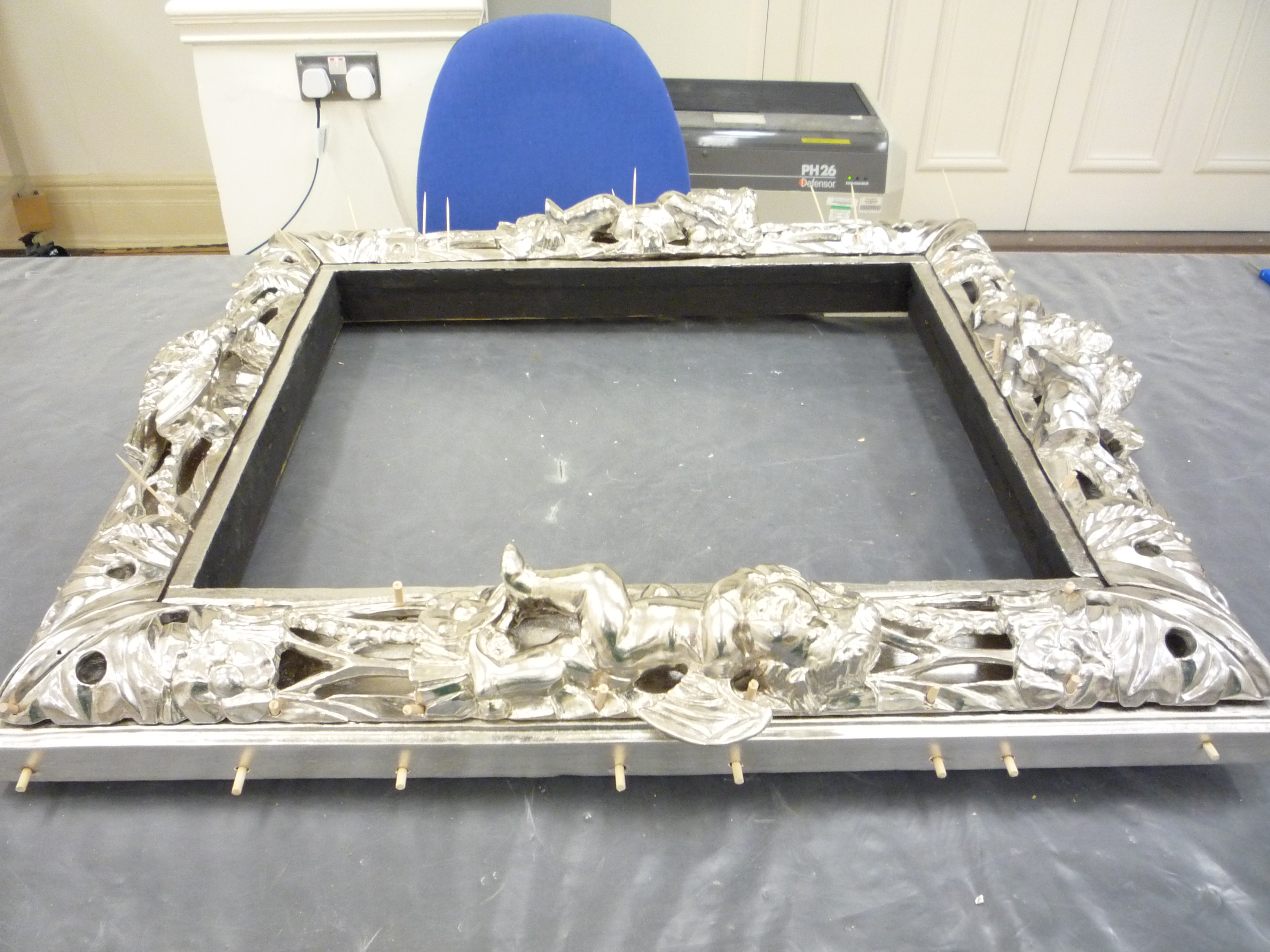 Silver leafed mirror frame c.1690