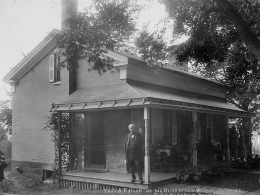 Thomas Edison visiting the Birthplace, which he then owned, on August 11th, 1923. On this trip, he brought Harvey Firestone and Henry Ford (who you can barely make out on the porch) along with his family. Source: Ohio Memory