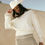 Thumbnail: Knit V-Neck Exposed-Seam Sweater
