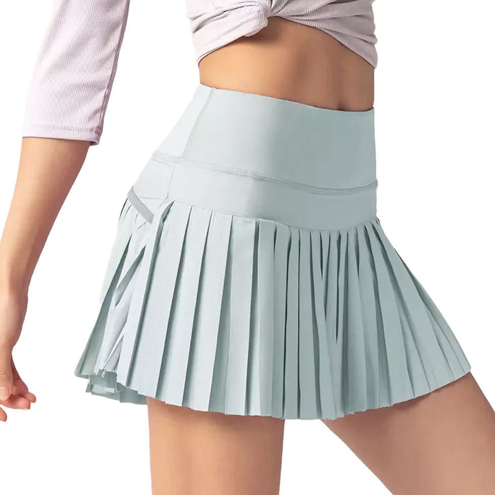 Thumbnail: a model wearing the pleated high-low tennis skirt in heather mint - side view