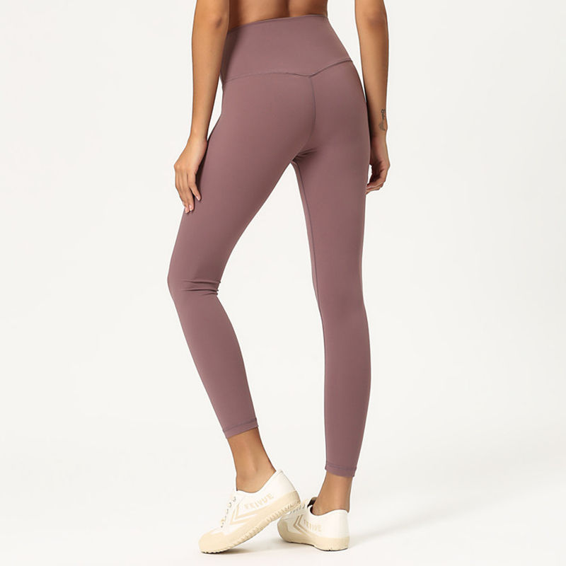 Thumbnail: a model wearing the 25-inch soft touch seamless leggings in dusty rose - back view