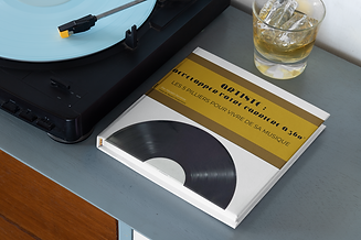 mockup-of-a-squared-book-next-to-a-recor