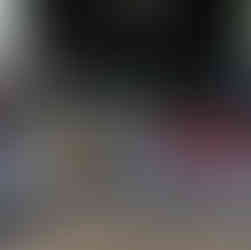 The back of a Buick Regal with a license plate reading "I Boostin."