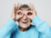 Elderly lady being silly. Laughter Care Laugh Therapy UK workshops