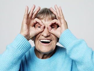 Elderly lady being silly. Laughter Care Laugh Therapy UK workshops