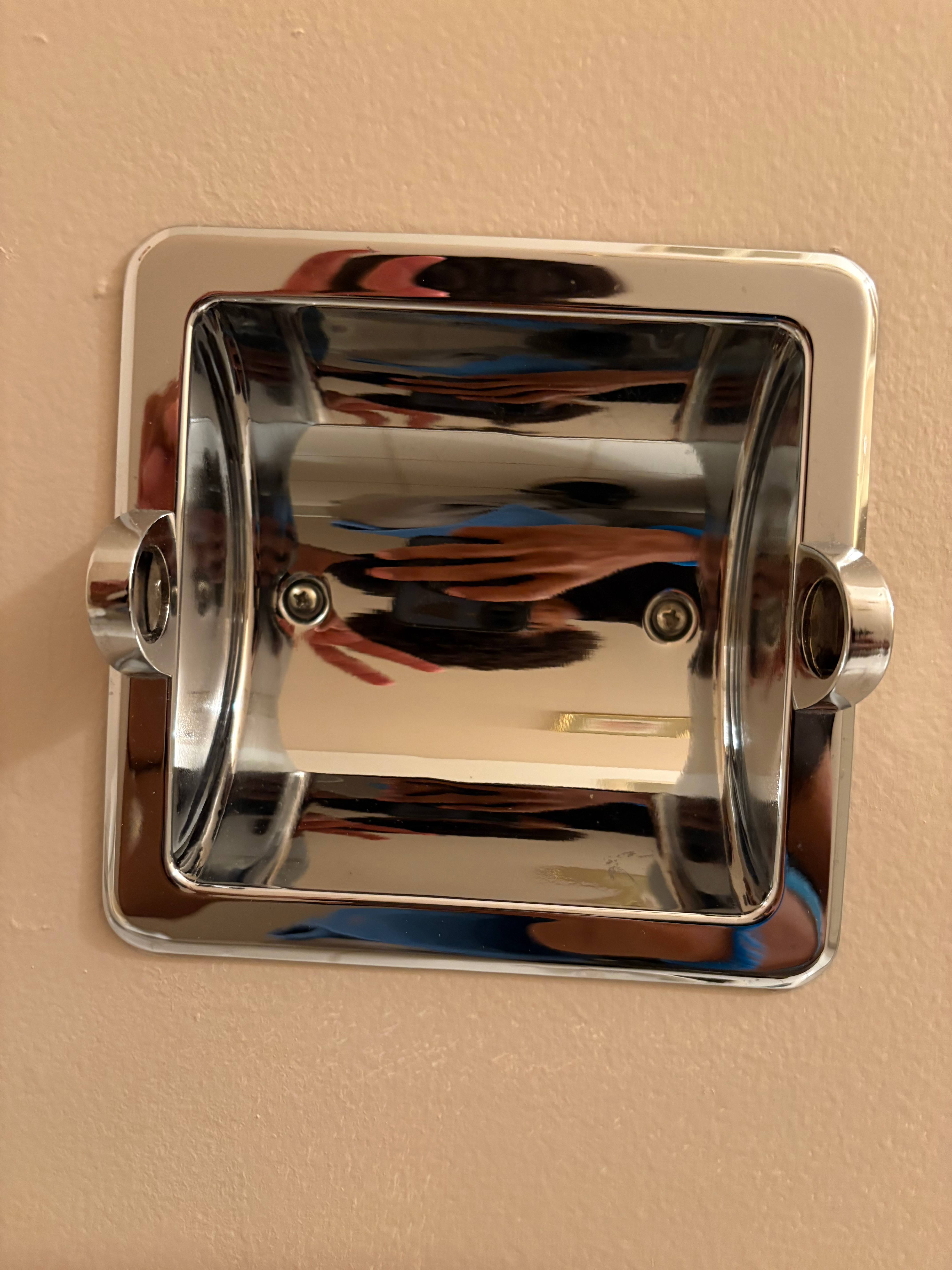 Cleaned toilet paper holder #1.HEIC