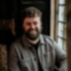 Ben Bennett from The Waves Collective Wedding & Events Band portrait smiling photo