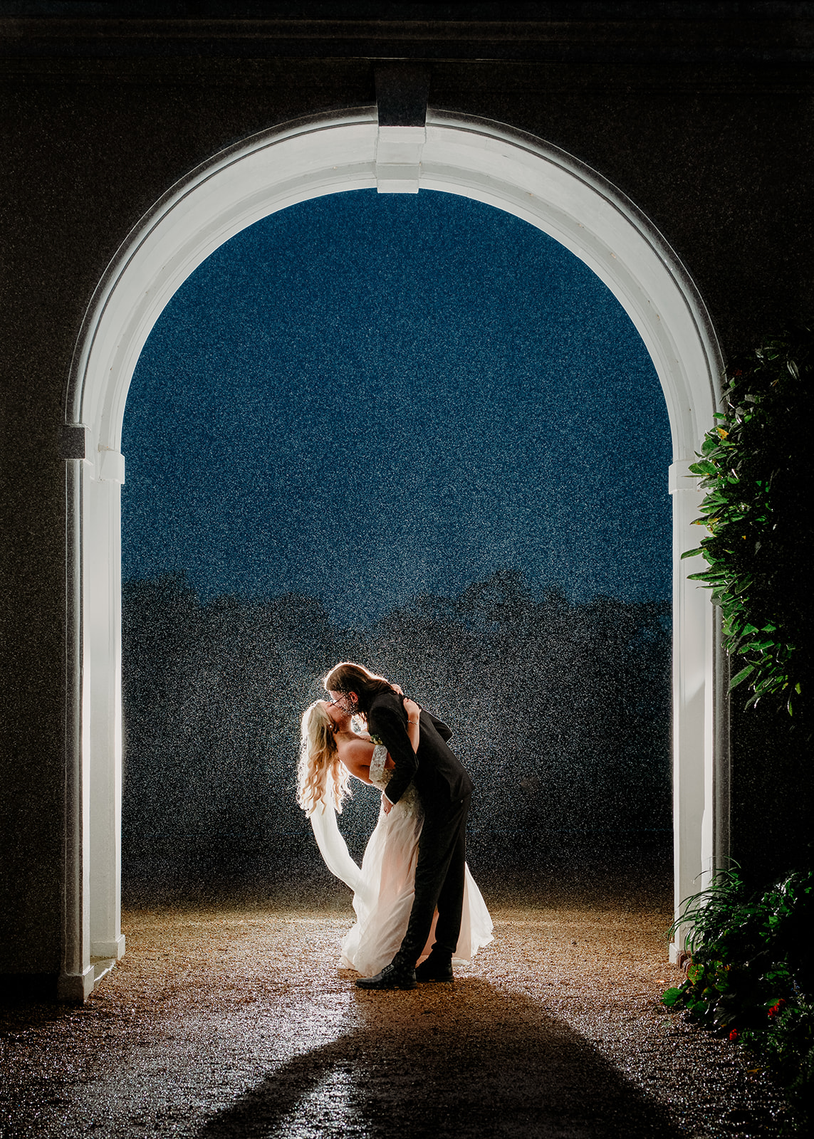 Colour arch wedding photo