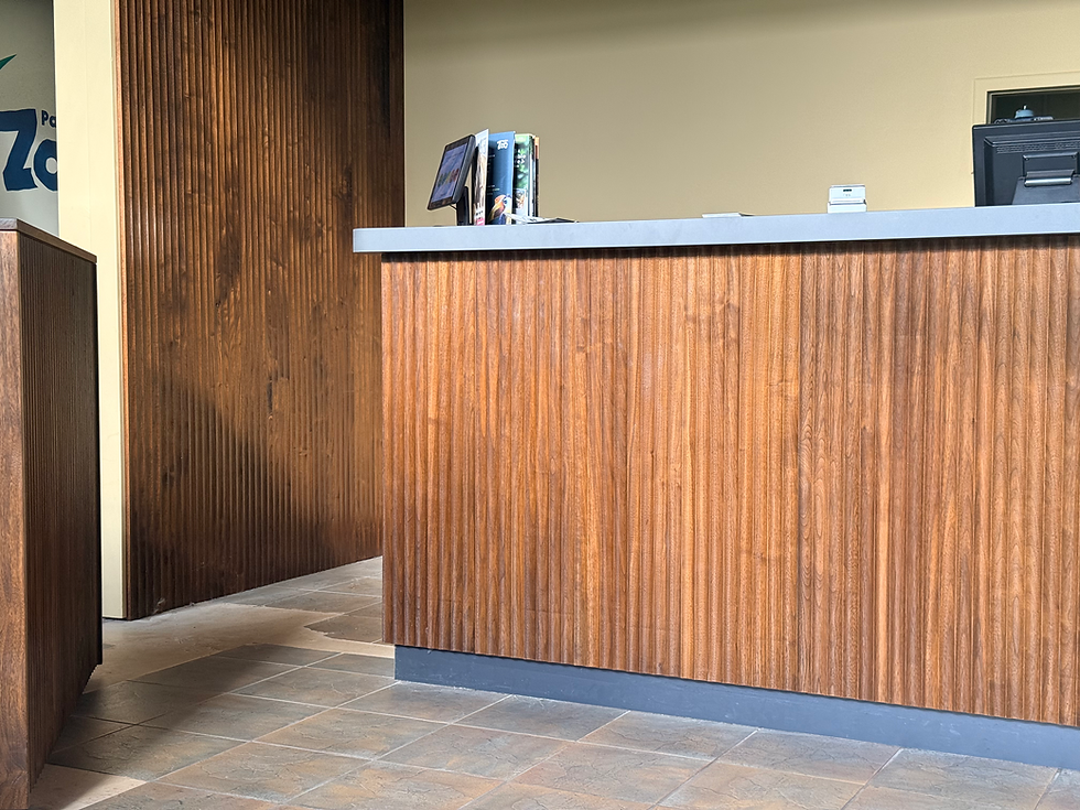 Bespoke joinery showing wooden reception area hand built by Dyson Goss Joinery for Paignton Zoo