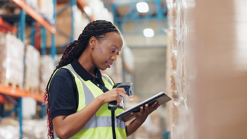 Warehouse staff managing industrial equipment inventory