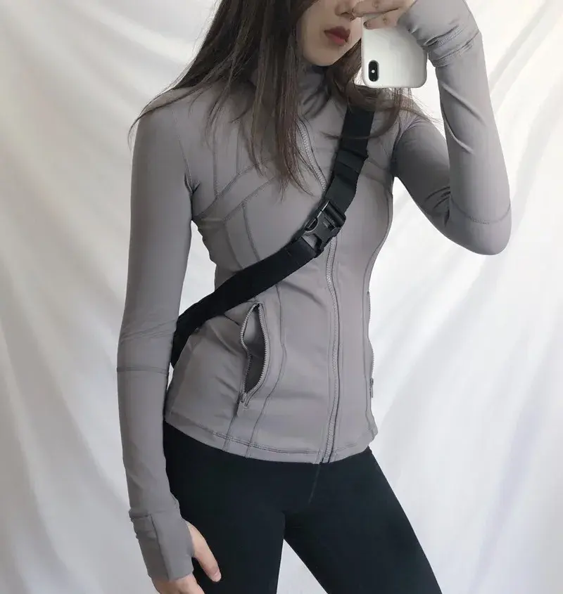 Miniatura: Chaqueta deportiva mujer entallada con cremallera