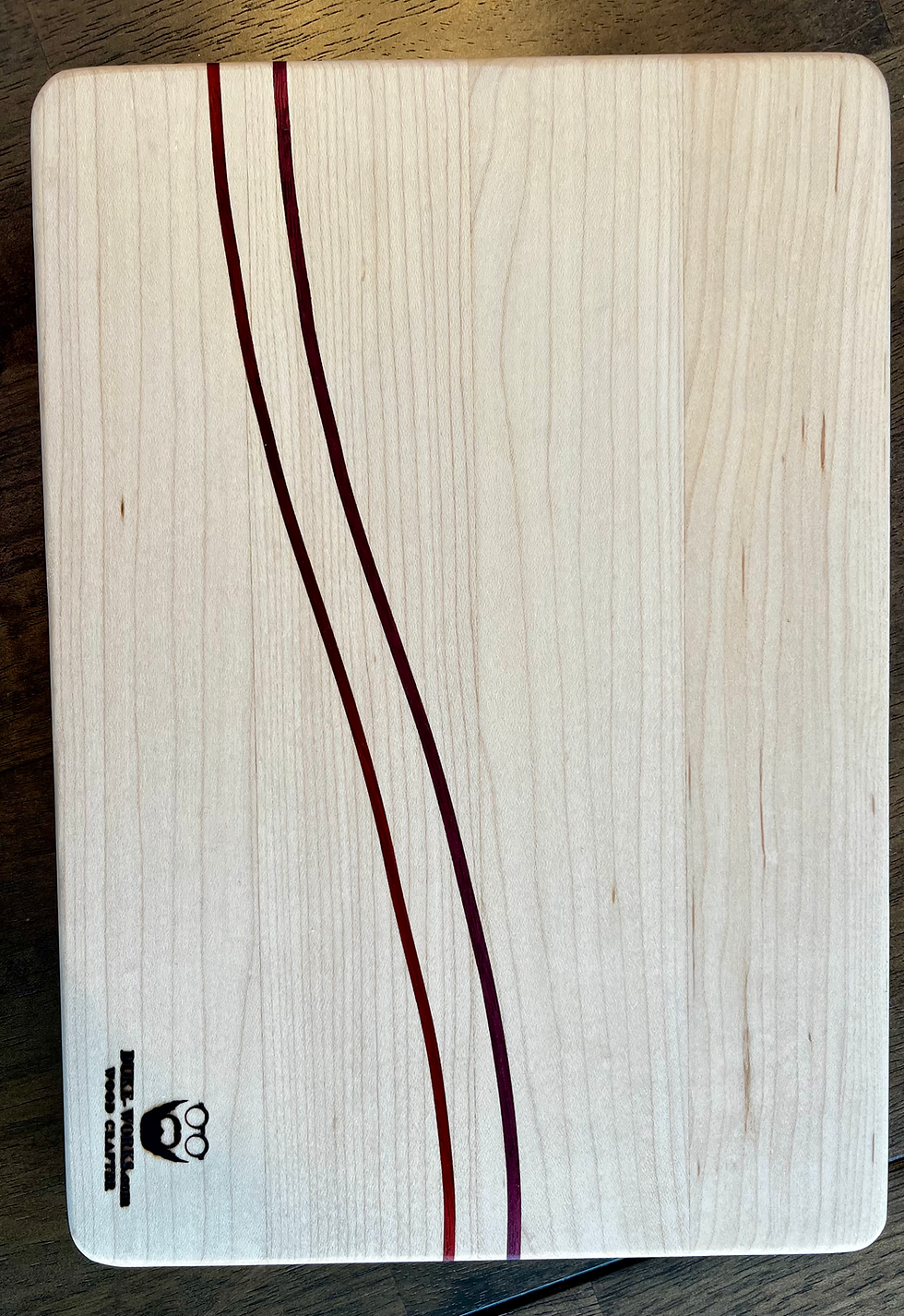 Thumbnail: Cutting Board with Padauk and Purple Heart Inlays