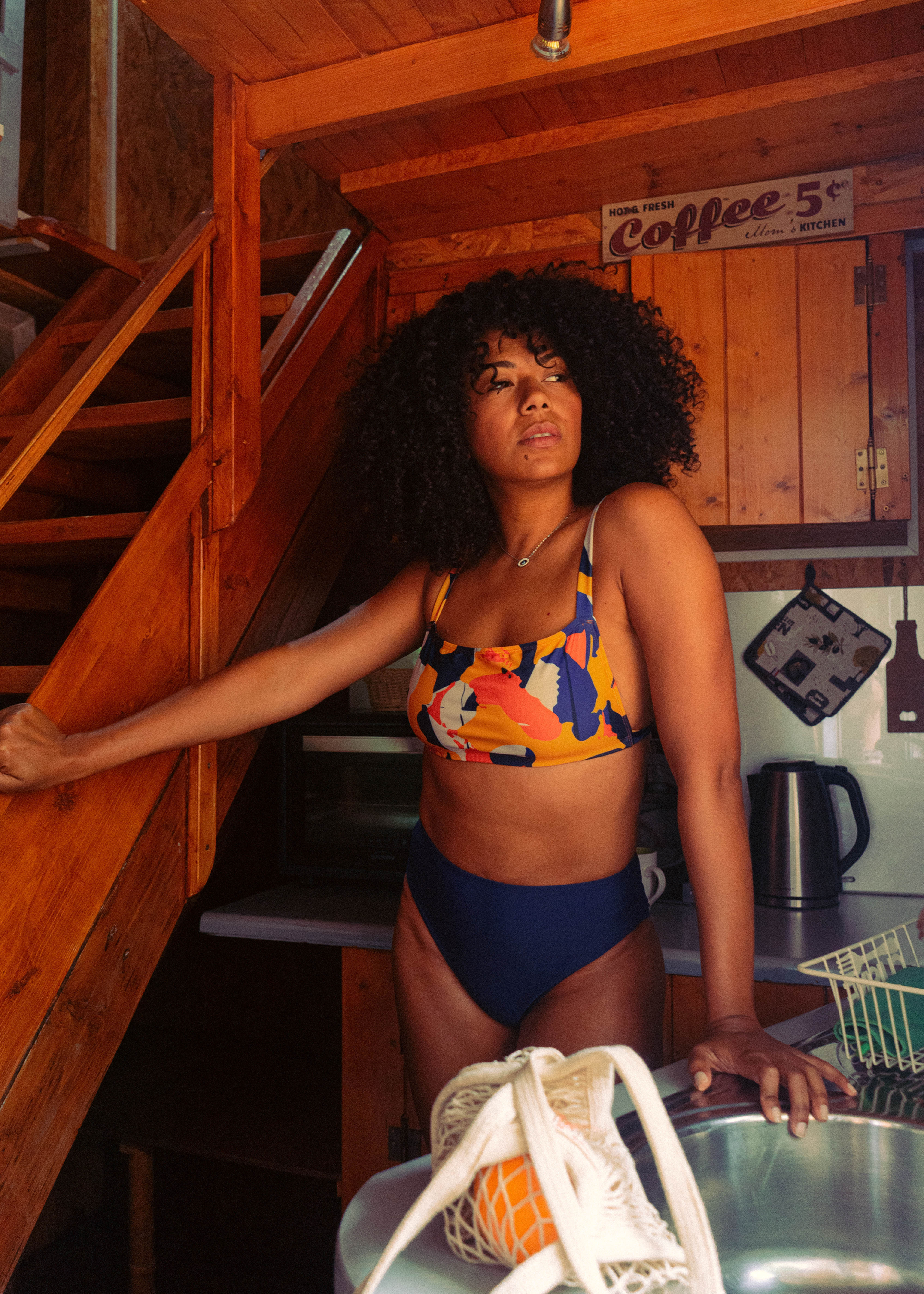 high waist blue bikini bottom with printed bikini top