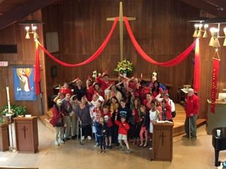 Pentecost parishioners in red.jpeg