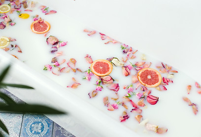 bath with milk and flowers.jpg