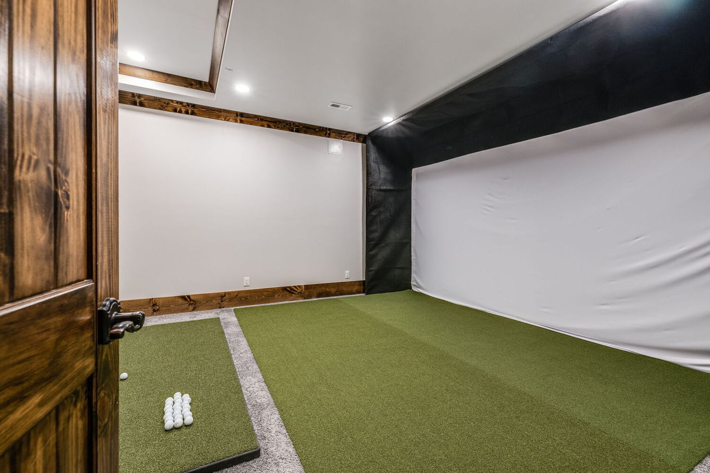 Custom wine room remodel by TwinBrother Builders, combining functionality and style to create the perfect wine storage space.