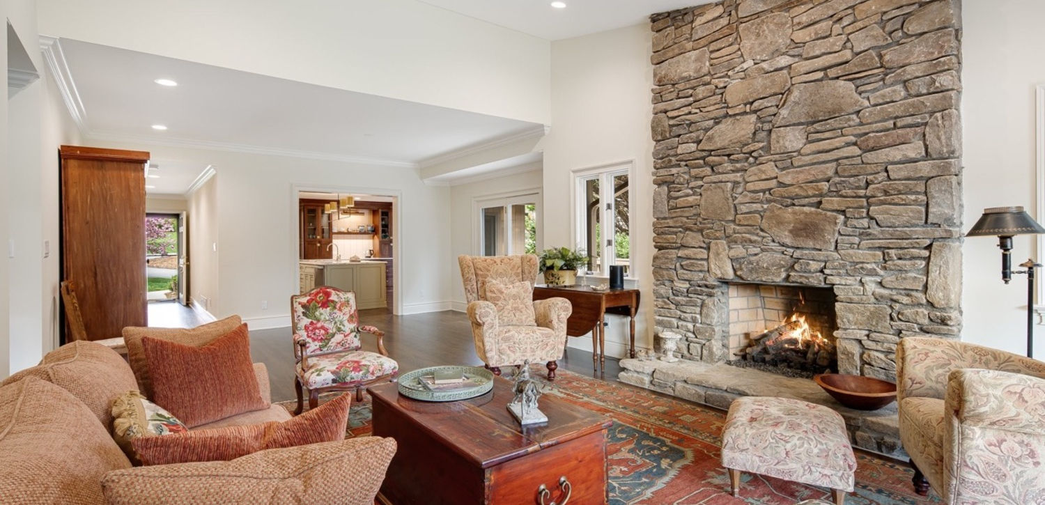 After Luxury living room remodel by TwinBrother Builders, featuring modern design and high-end finishes in Asheville, NC.