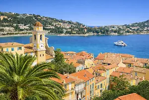 Luxury Yacht Charter – Discover Villefranche-Sur-Mer: Breathtaking views overlooking the beautiful harbor town, the vibrant waterfront, and the coastline.