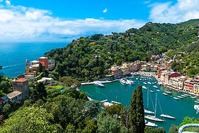 Luxury Yacht, Sailing yachts and catamarans anchored in the harbor of Portofino, Italy.