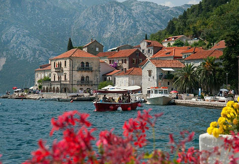 Perast in the Bay of Kotor seen from the water during a luxury bareboat charter.