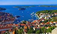 Hvar town and harbour with Pakleni islands — bareboat yacht charter Croatia Adriatic.