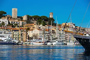 Luxury Yacht Charter – Discover Cannes: Stunning views overlooking the beautiful harbor town, the vibrant waterfront, and the coastline.